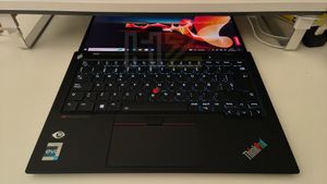Trackpoint Button Red “button” in the middle of the keyboard: what’s it for?