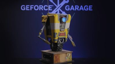 PC gaming personalizado con la forma del robot Claptrap de Borderlands 4, con acabado metálico amarillo envejecido, un ojo azul iluminado y una antena, sobre un fondo oscuro