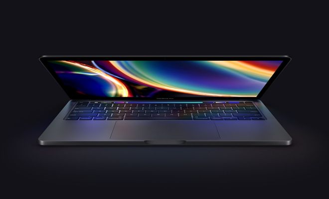 Portátil MacBook pro con pantalla semiabierta y fondo de pantalla encendido