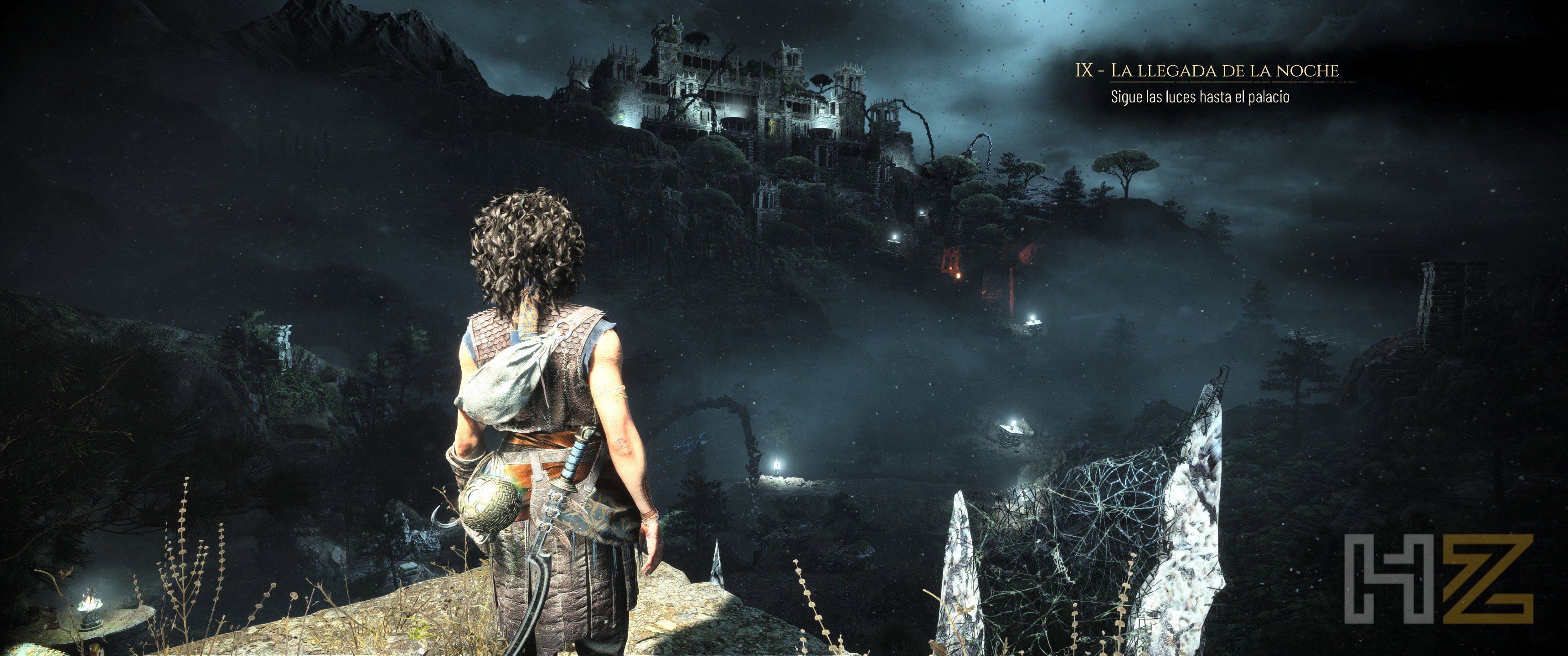 Vista en tercera persona de Amicia mirando hacia un castillo iluminado en una colina durante la noche en A Plague Tale.