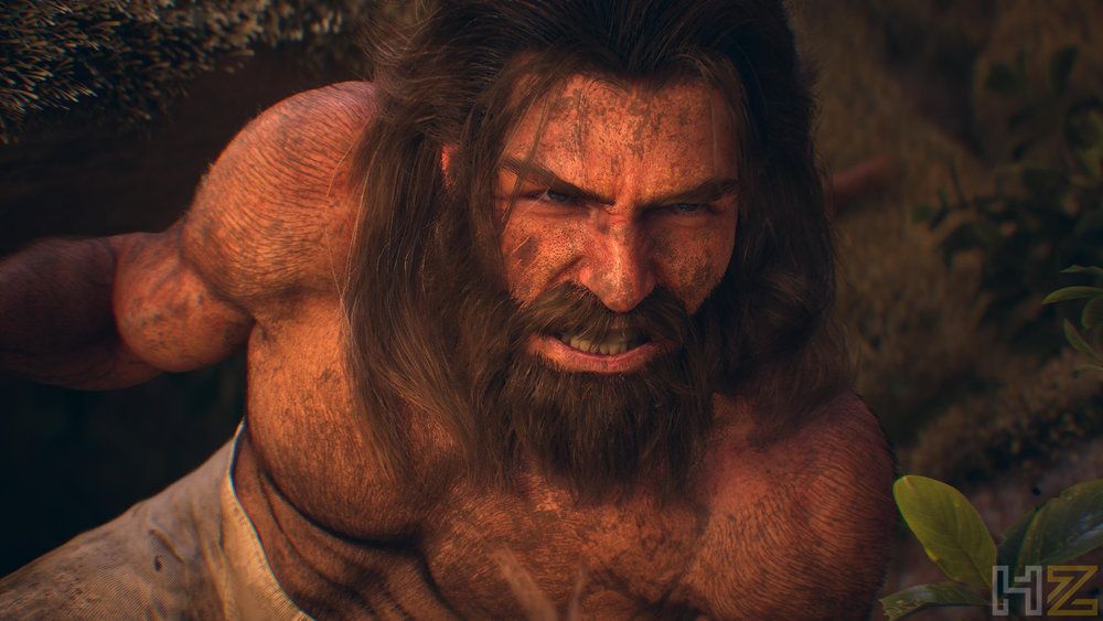 Primer plano de Lobezno con barba, pelo largo y expresión de ira en un entorno natural.