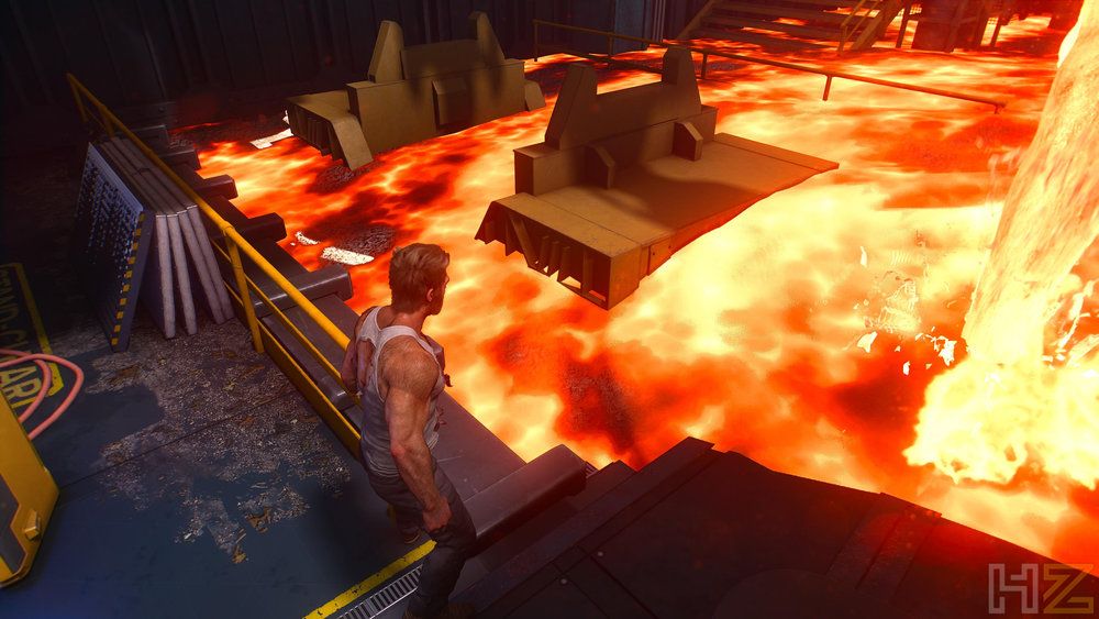 Logan frente a una zona inundada de lava en un entorno industrial.