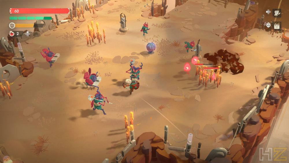 Combate en una mazmorra desértica con múltiples personajes y enemigos en Moonlighter 2: The Endless Vault.