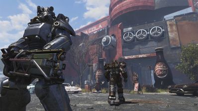 Dos personajes con servoarmaduras en el exterior de la fábrica de Nuka-Cola en Fallout 76.
