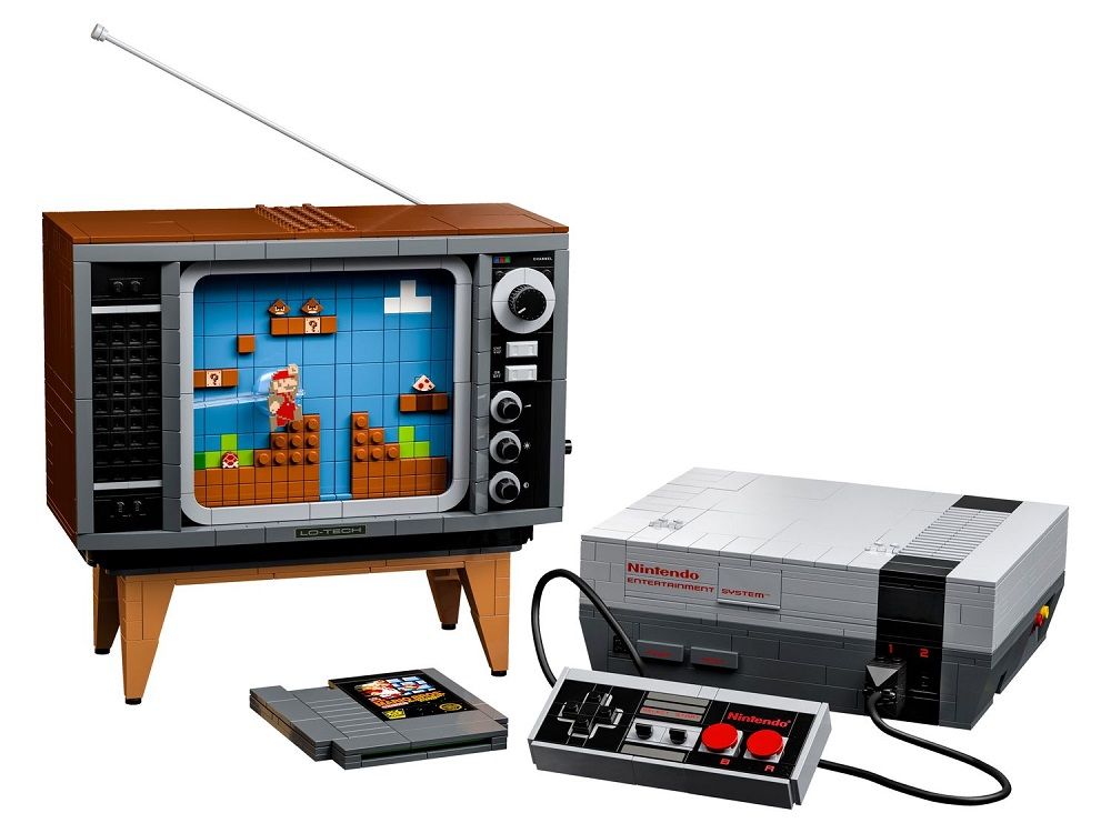 Maqueta de LEGO que representa una consola Nintendo NES, un mando, un cartucho y un televisor retro con una pantalla de Super Mario Bros.