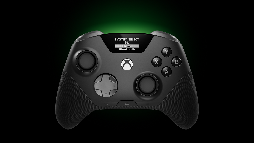 Mando inalámbrico SteelSeries Aeon Pro con pantalla OLED integrada mostrando el menú de selección de sistema entre PC, Xbox y Bluetooth.