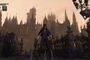 El cazador en Bloodborne frente a las torres de Yharnam con efectos de iluminación avanzados mediante RTX Remix.