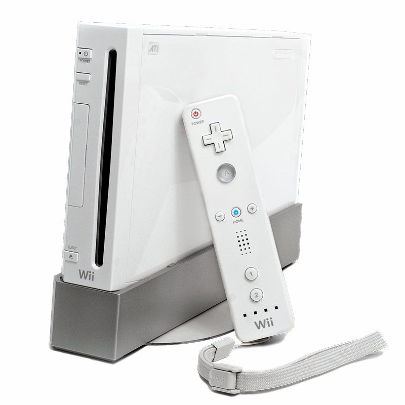 Consola Nintendo Wii de color blanco en posición vertical con su mando Wii Remote apoyado al lado.