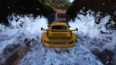 Porsche 911 GT2 cruzando una zona de agua en Forza Horizon 6 con efecto de salpicaduras laterales.