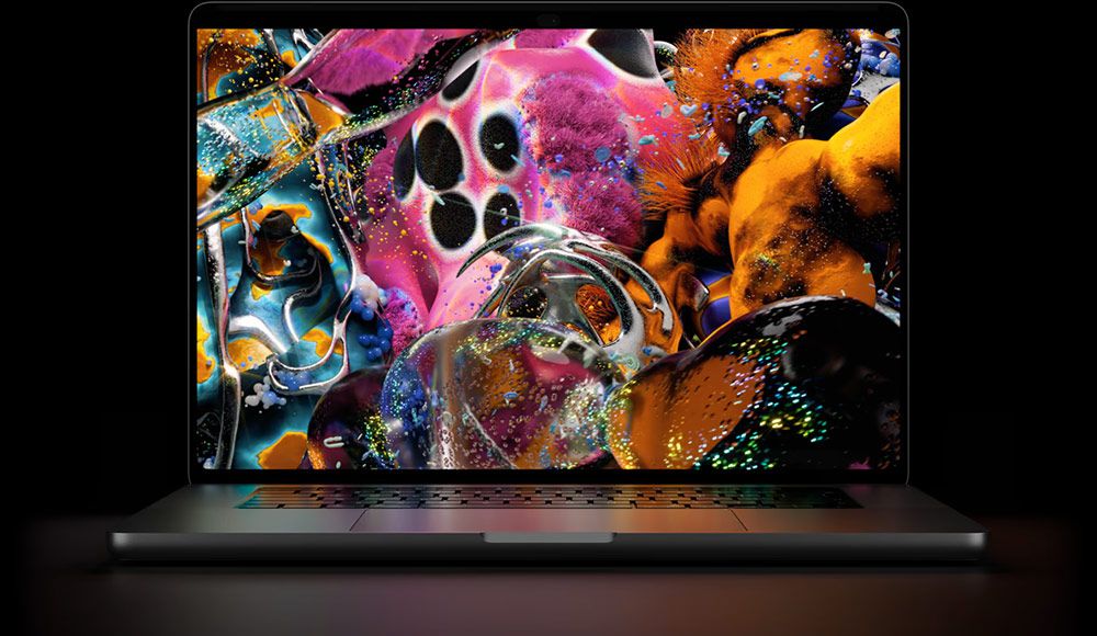 Ordenador portátil MacBook Pro con pantalla mostrando una imagen abstracta de colores vibrantes y texturas orgánicas sobre fondo oscuro.