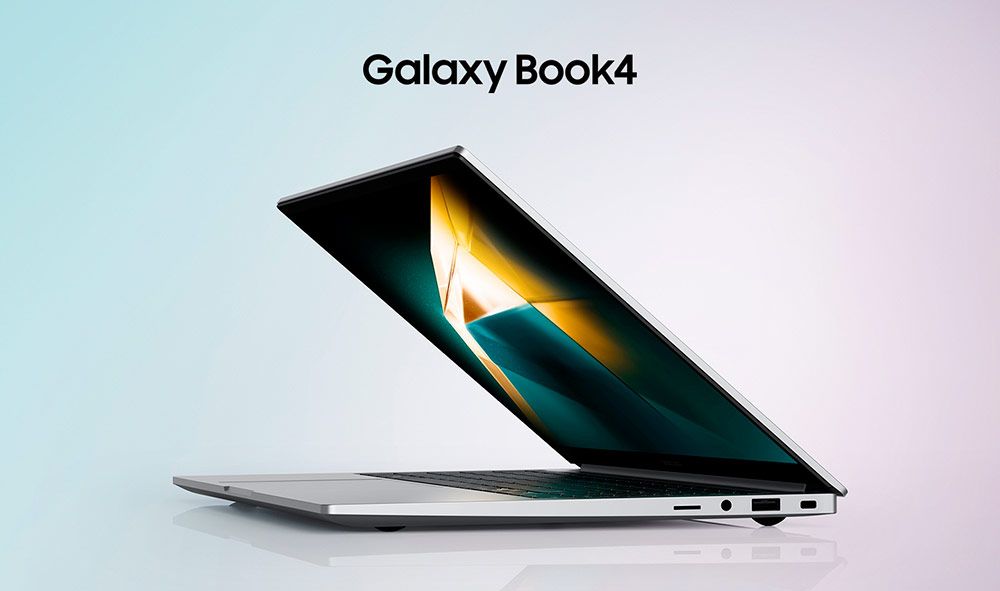Ordenador portátil Samsung Galaxy Book4 visto de perfil con la pantalla abierta sobre un fondo degradado.