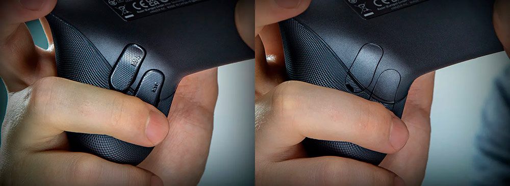 Primer plano de los botones traseros configurables del mando Razer Wolverine V4 Pro sostenido con las manos.